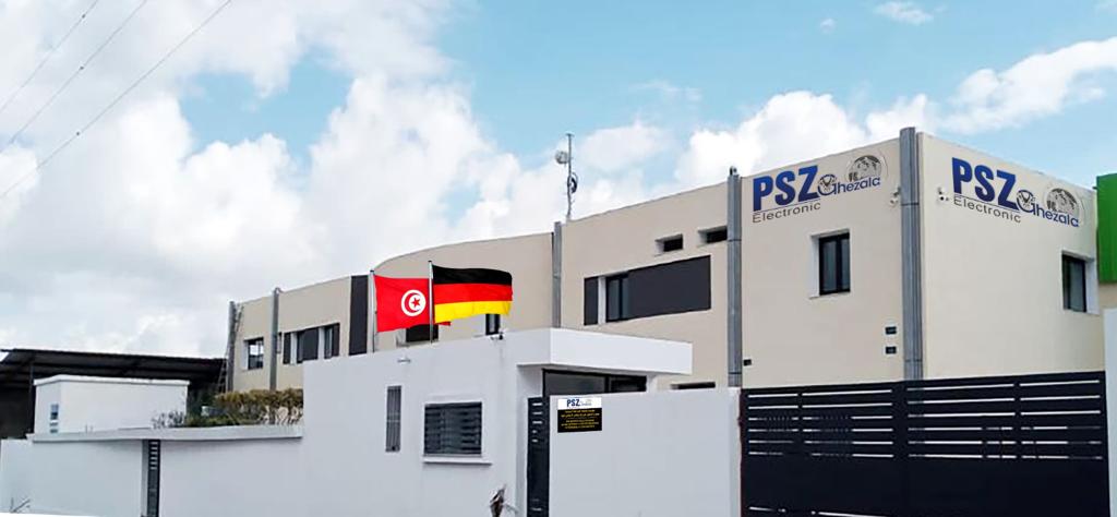 Gebäude von PSZ Ghezala mit tunesischer und deutscher Flagge